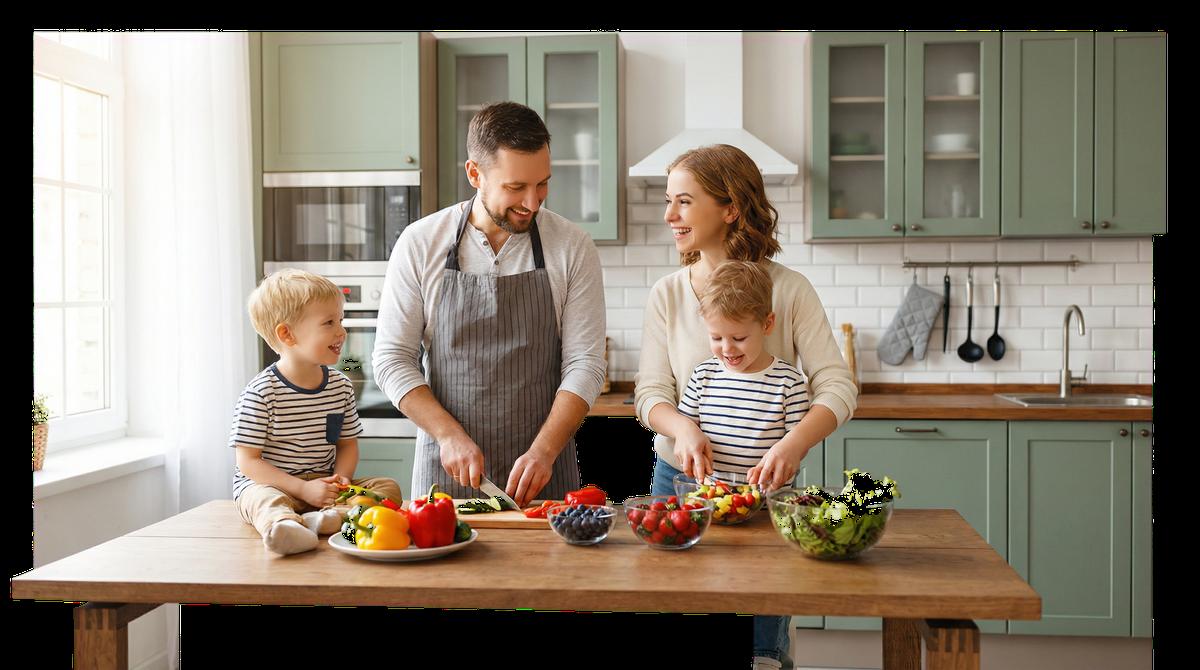 Family cooking healthy food together